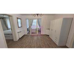 Apartament cu 2 camere, spatiu comercial – Campina, central