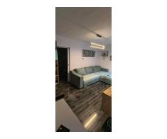 Apartament cu 2 camere, la parter, centrală proprie și aer condiționat